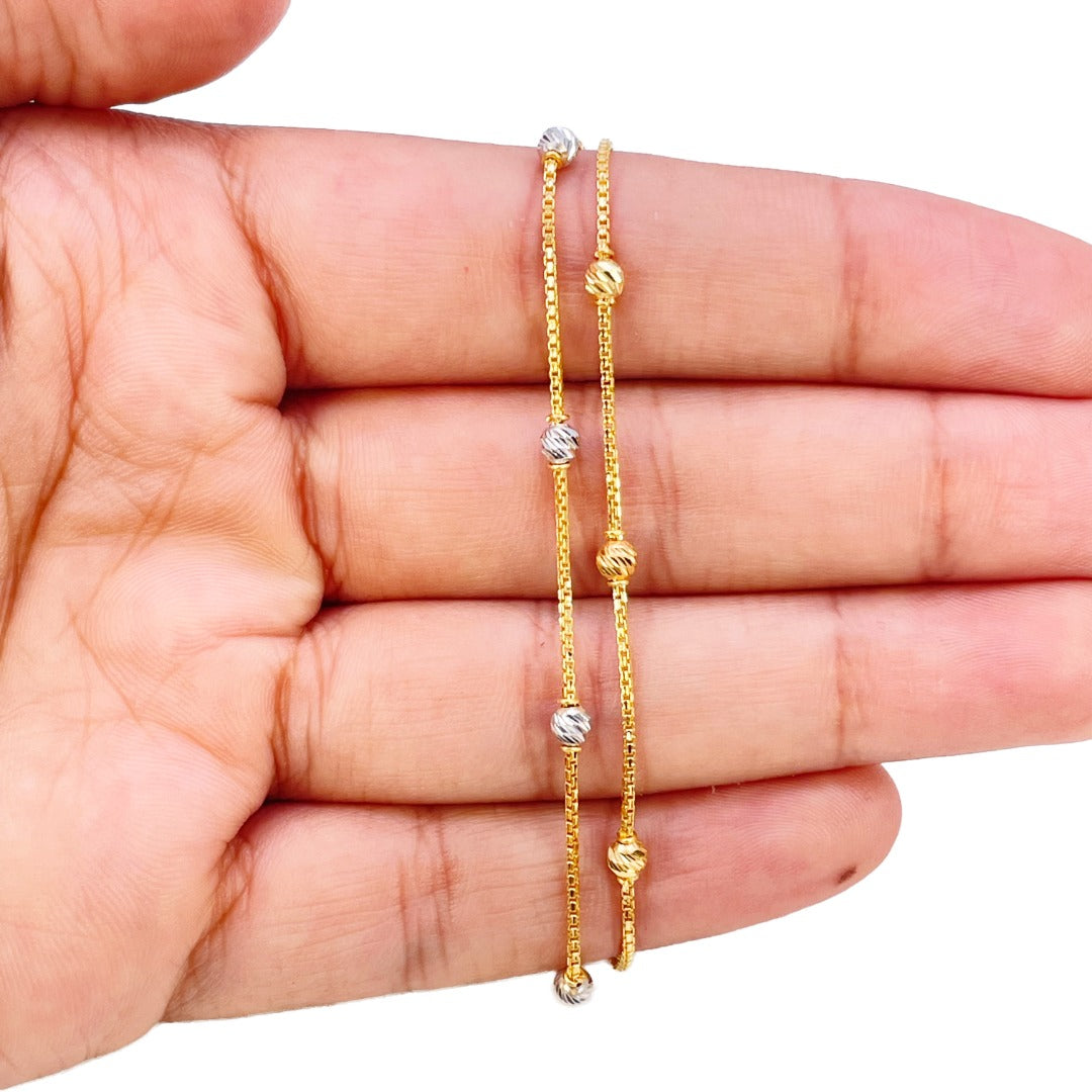 22 Karat Gelbgold Doppelreihiges Armband mit zweifarbigen Diamantschliff-Perlen