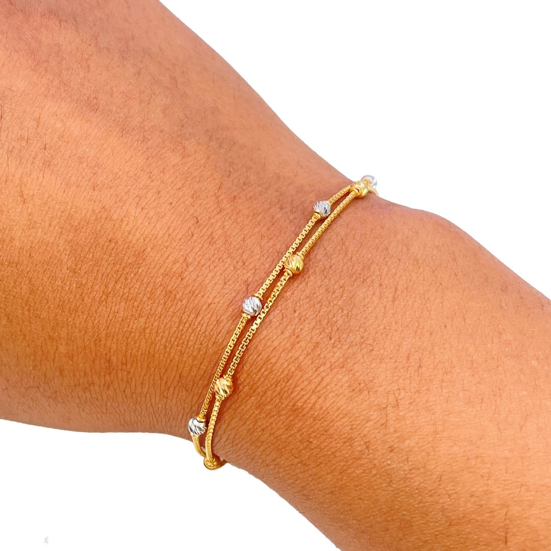 22 Karat Gelbgold Doppelreihiges Armband mit zweifarbigen Diamantschliff-Perlen