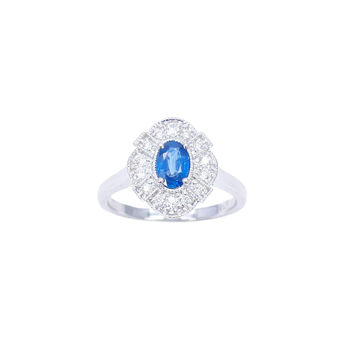 18 Karat Weißgold Ring mit ovalem blauem Saphir, Diamanten und Milgrain-Verzierung 0,65ct