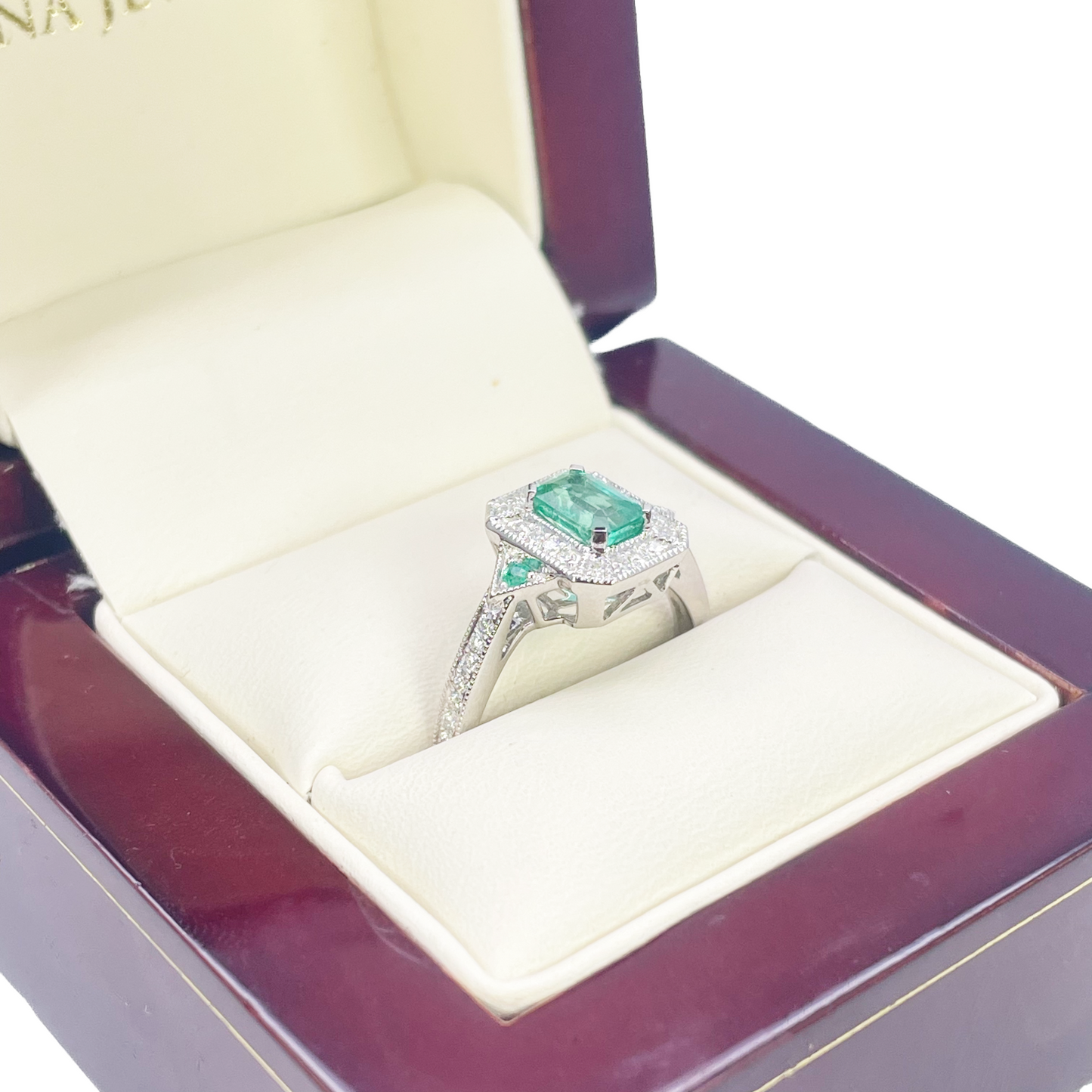 18 Karat Gold Ring mit Natur-Smaragd, Diamanten im Rund- und Smaragdschliff, 0,80 Karat